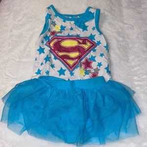 Super girl, 18 month, blue and white with a pink super man logo